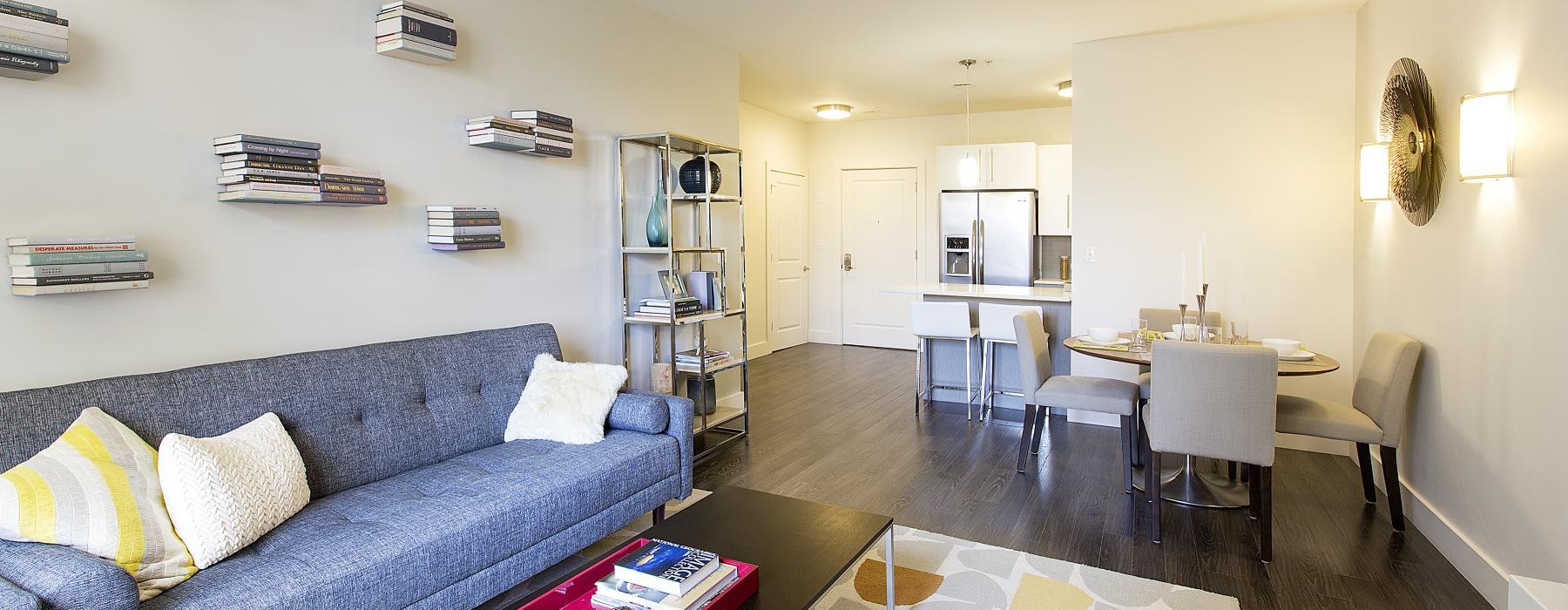 a living room with a couch and a table