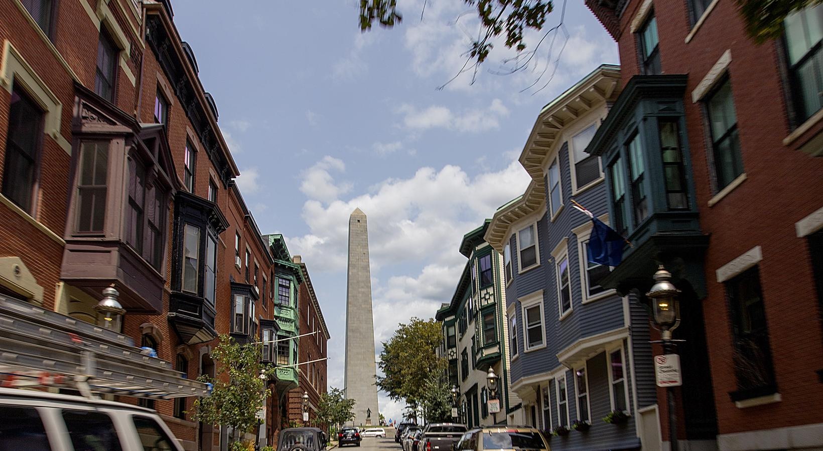 Find your perfect fit at Gatehouse 75 a street with cars and buildings on either side of it