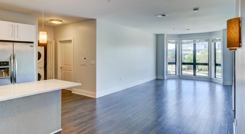 a kitchen with a wood floor